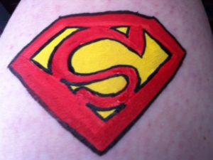 Superman logo Face Painting at Gold Coast and Surfers Paradise